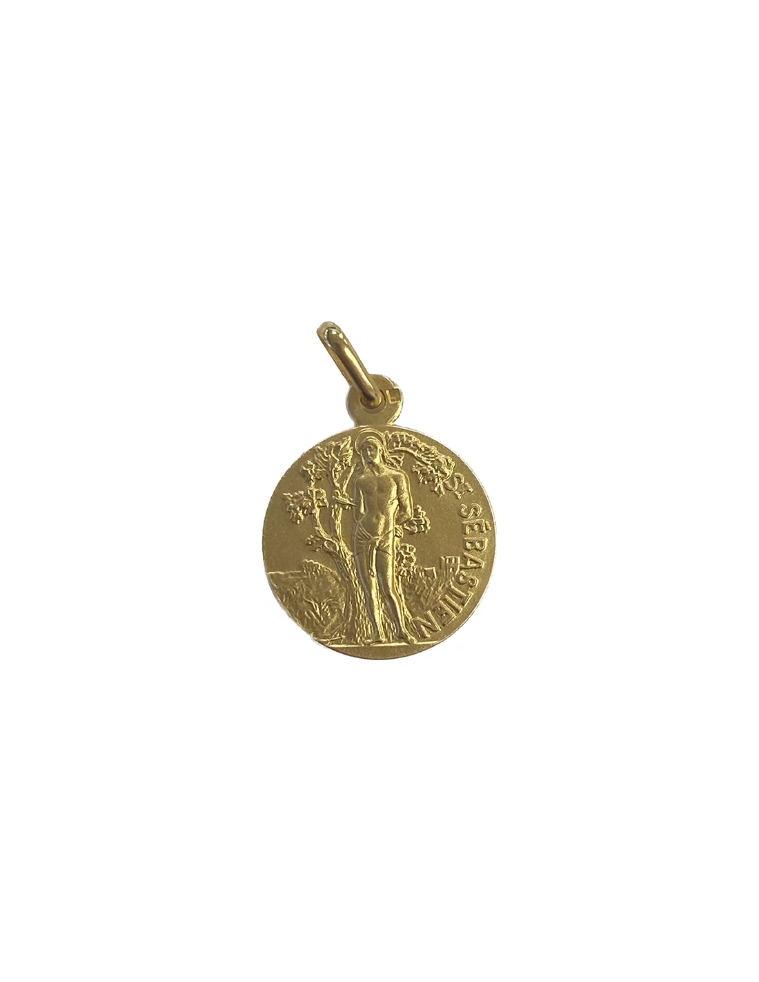 Une Médaille D'or Avec Une étoile Dessus Est Accrochée à Un Mur En